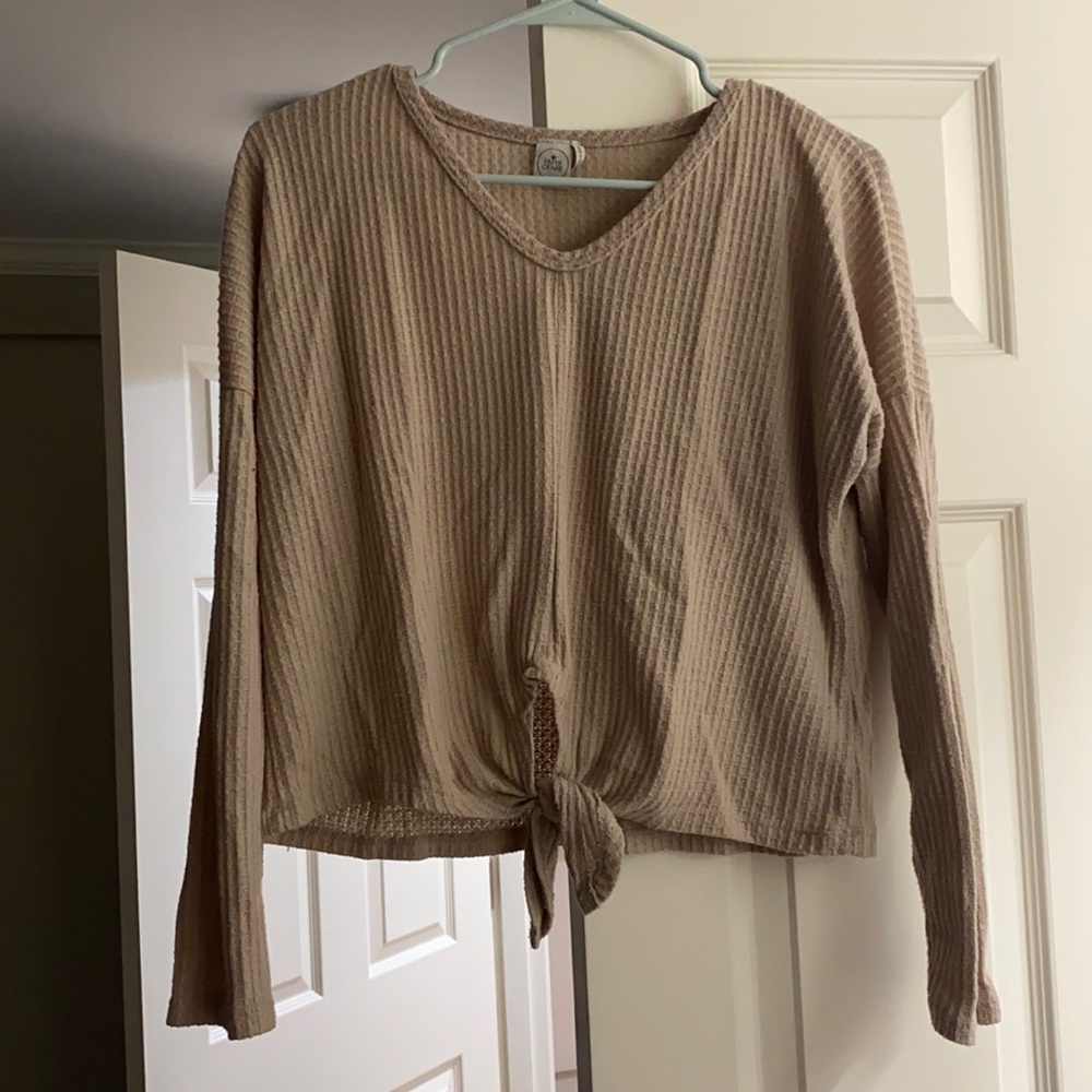 Long sleeve knit shirt w/ tie front. Warm and comfortable material!